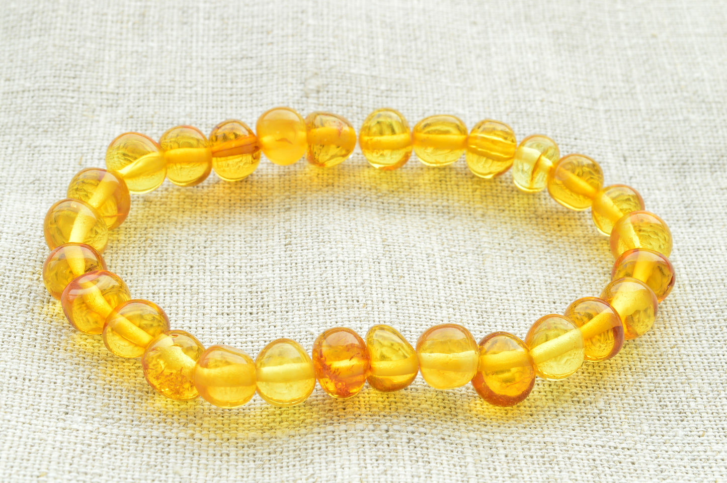 Natural baltic amber Polished_Baroque_beads_orange_color_elastic_bracelet