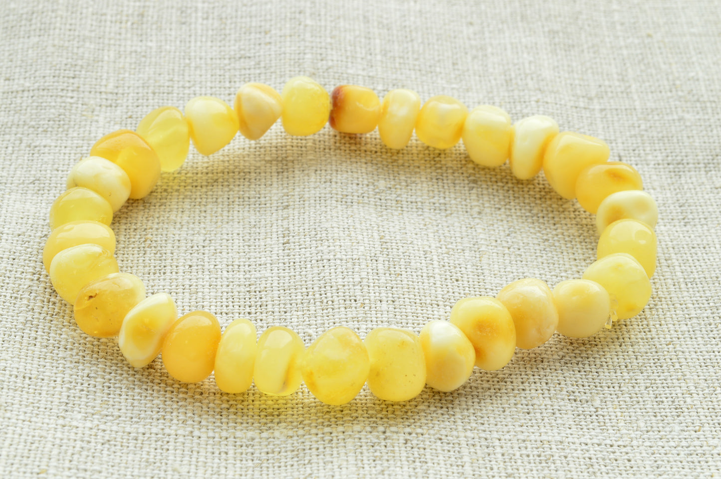 Natural baltic amber Polished_Baroque_beads_white_color_elastic_bracelet