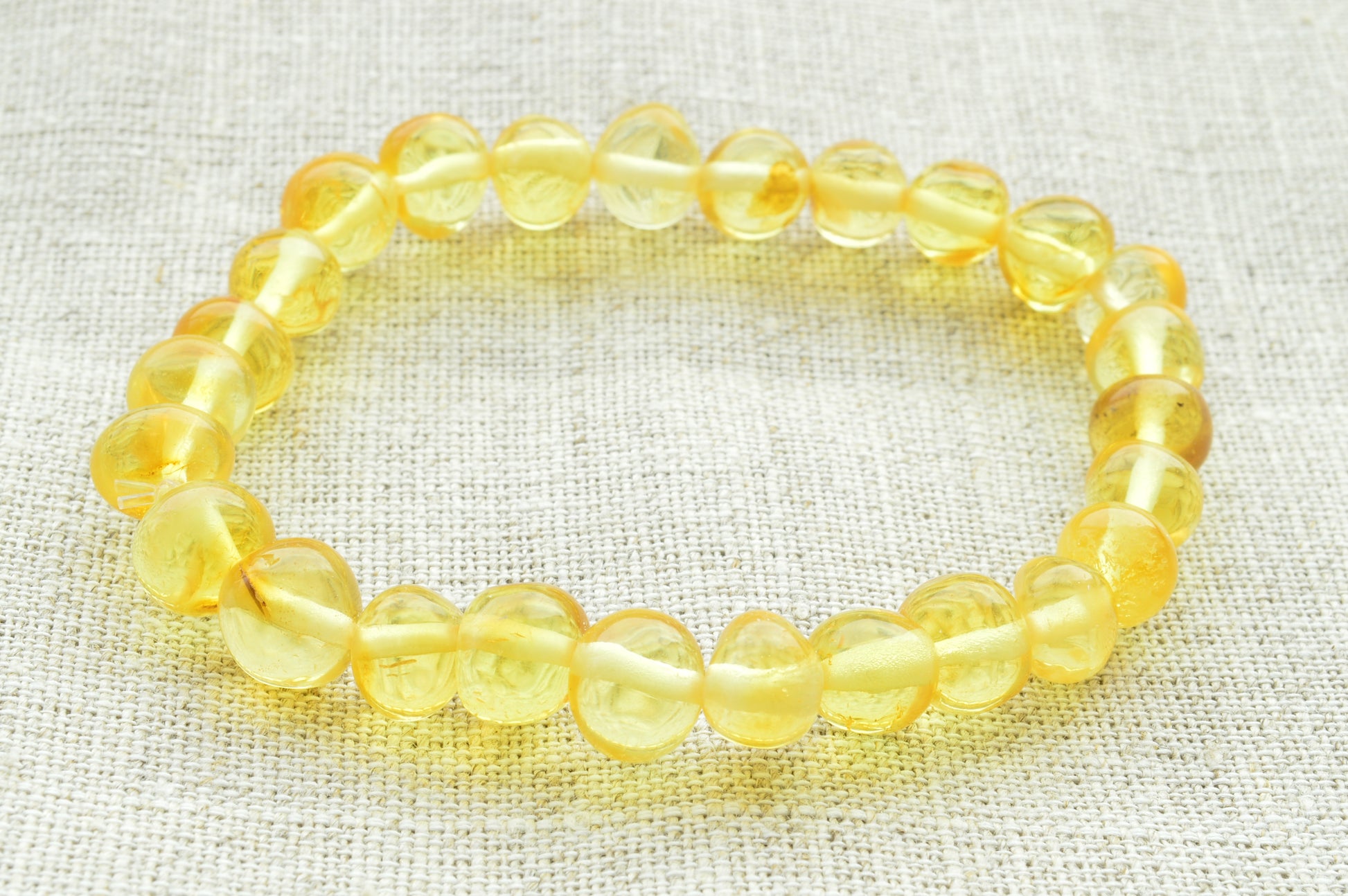 Natural baltic amber Polished_Baroque_beads_yellow_color_elastic_bracelet