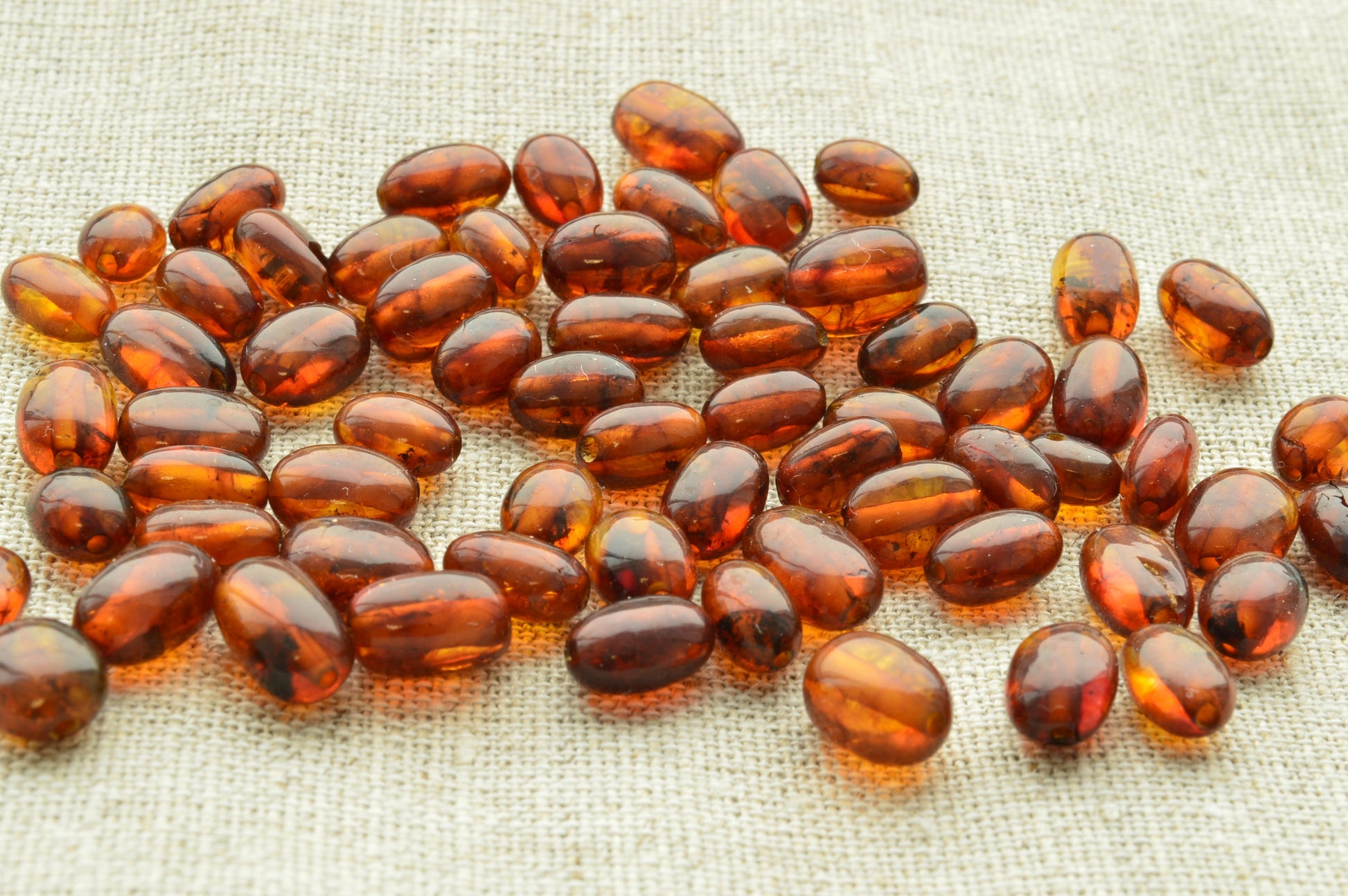 natural baltic amber loose beads polished oblong brown